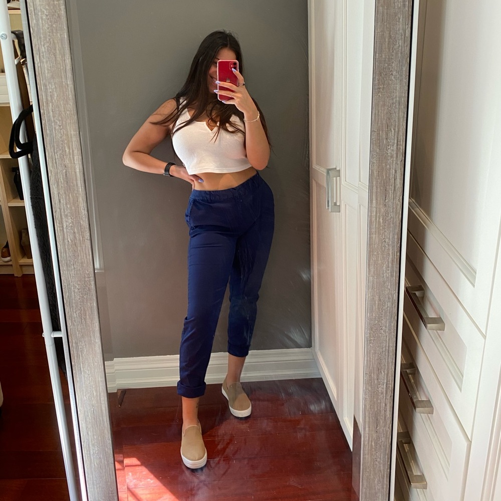 Blue docker style pants.